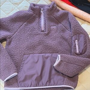 Women’s 
Size small: medium 
Purple